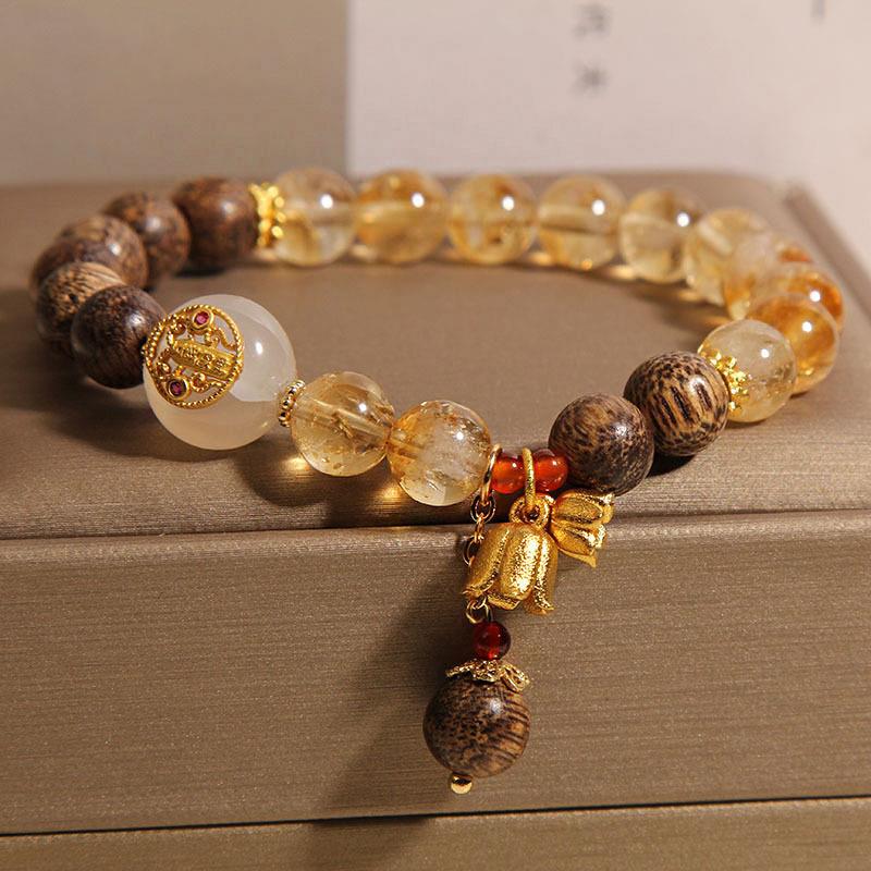 天然黄塔晶手链女轻奢小众精致沉香木珠铃兰花转运手串送闺蜜礼物