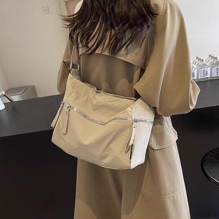 法国CavienKIon休闲旅行百搭斜挎包帆布简约托特包背包通勤单肩包