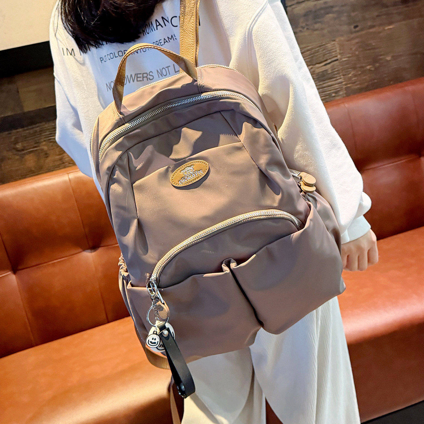 法国DUDK高级感大容量双肩包女新款通勤简约背包轻便旅行电脑包潮