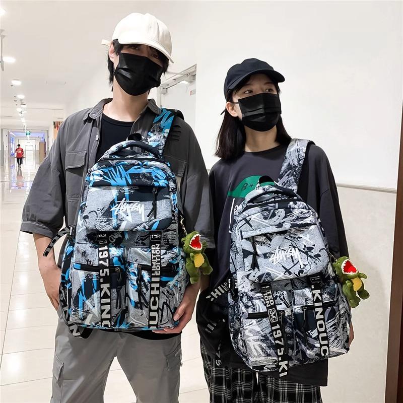 香港IT.greg2026新款男士双肩包初高中生大容量书包时尚涂鸦背包