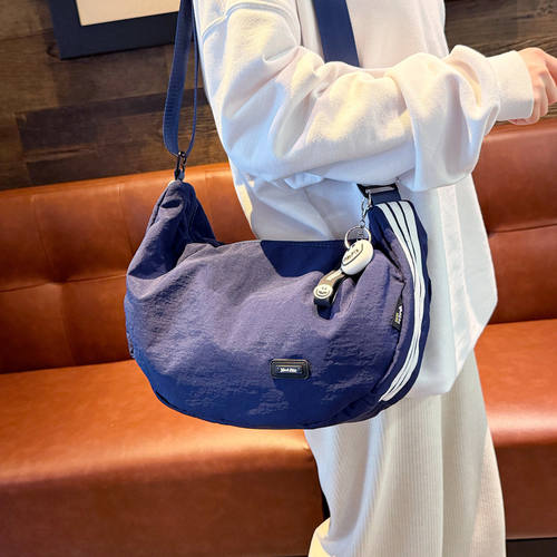 法国DUDK轻便饺子包新款女包大容量休闲百搭单肩斜挎包时尚机车包