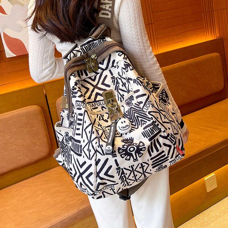 法国DUDK新款大容量双肩包女时尚轻便旅行电脑背包高级感学生书包