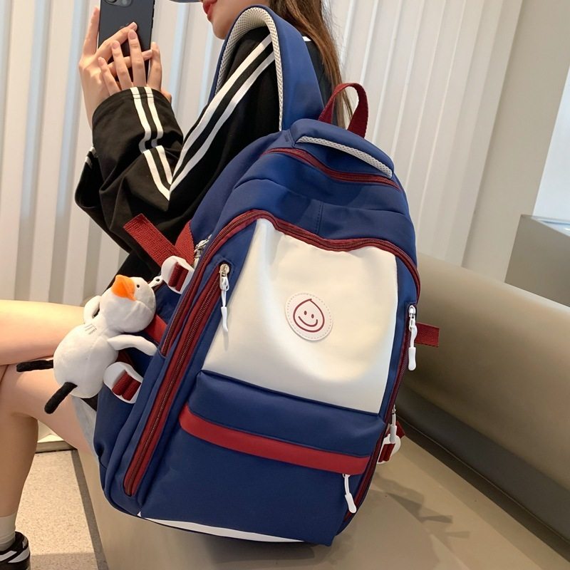 法国MlcanIKans双肩包小学生补课袋2024新款拼色女初中生书包减负