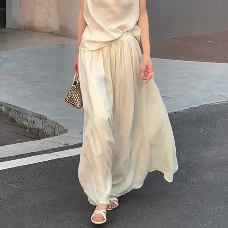 杏色宽松时尚垂坠感大码半身裙女2025夏季新款高级修身显瘦仙女裙