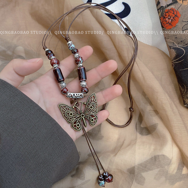 新中式蝴蝶陶瓷项链女复古民族风长款配饰轻奢小众高级感吊坠