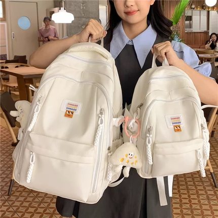 2025年初中生书包女大学生简约百搭大容量高中学生小背包女双肩包