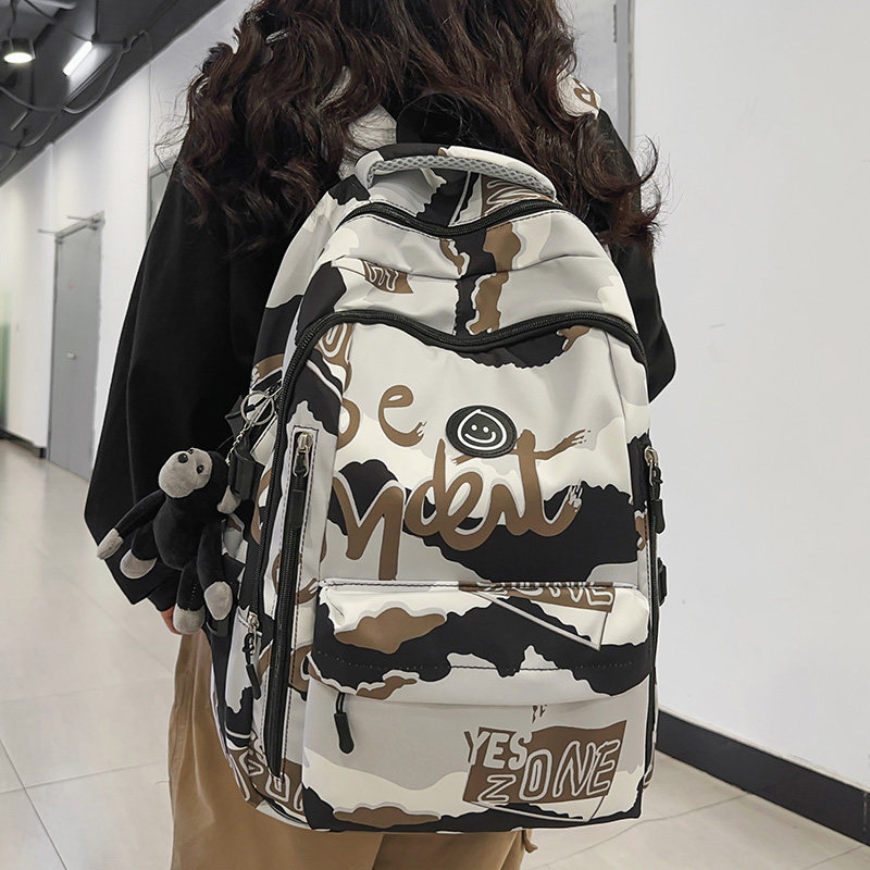 涂鸦风书包男大学生高中生双肩包初中生日系ins原创背包女大容量