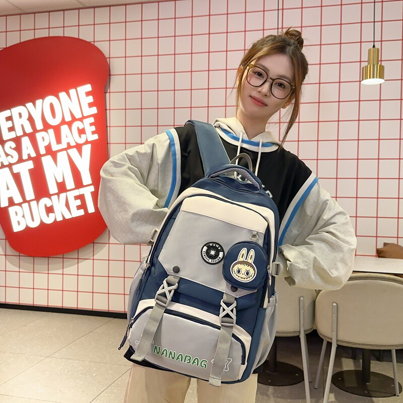 卡通风撞色双肩包女学生书包大容量中学生初中生旅行背包女高颜值