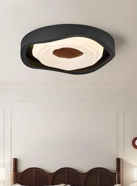 Its an extremely simple bedroom. Its a modern, simple, cre