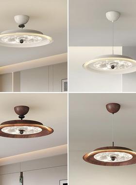 The chandeliers of the walnuts restaurant are modern, simple