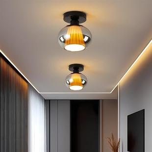 the lights glass doorway. closed are hallway The