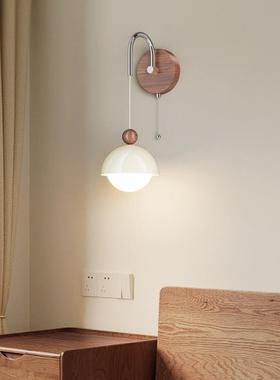 A new French medium-winded bedroom walllight on the cream wi