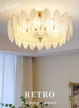 In the French repeat living room, a new glass feather lamp o
