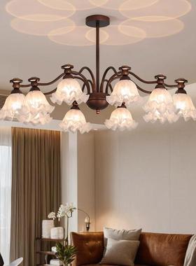 U.S.-French-style chandeliers and creative red bell orchids.