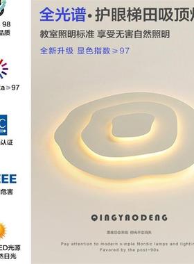 The bedroom lights are modernly alighted, arguably simple, m