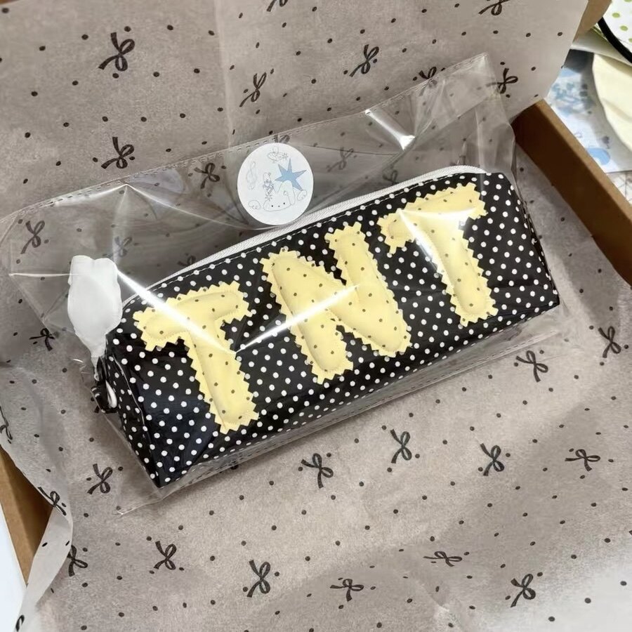 时代少年团TNT周边黑色波点笔袋图片