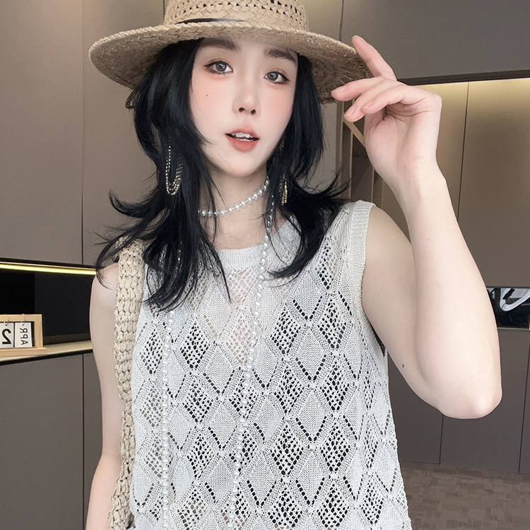 针织背心女2026春季新款时尚钩花镂空荷叶边拼接下摆圆领无袖上衣