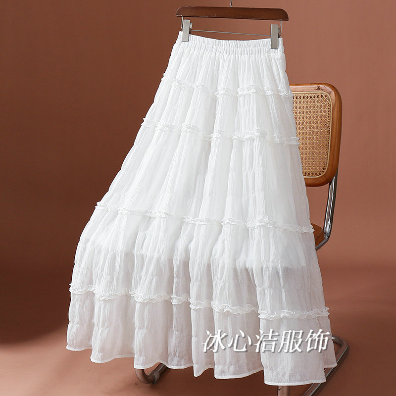 白色好看肌理感木耳边蛋糕裙半身裙女秋冬2025新款a字大摆长裙子
