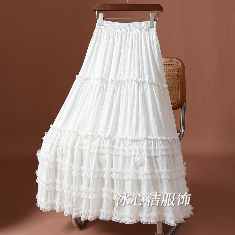 白色绝美漂亮木耳边半身裙女秋冬2025新款黑色拼接蛋糕裙A字长裙