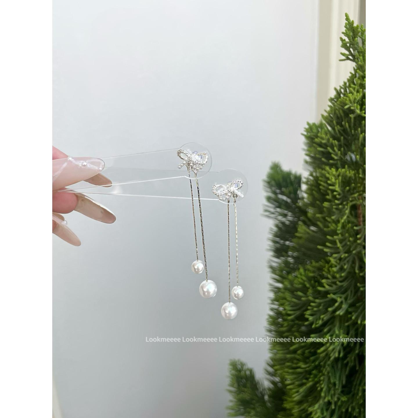 s925银针珍珠蝴蝶结两戴耳环