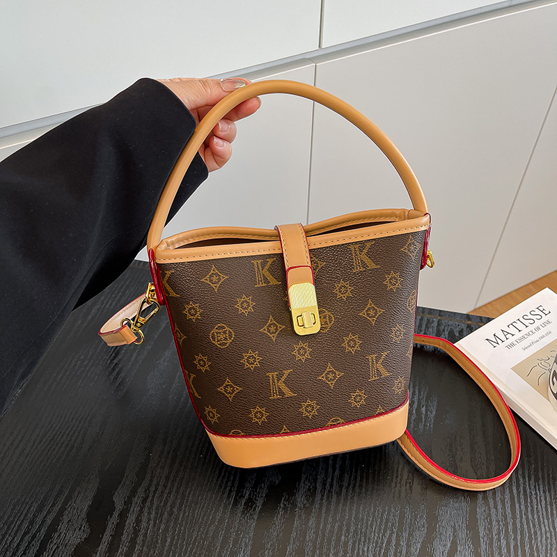 老花轻奢复古水桶包女2025春夏新款百搭高级感爆款单肩斜挎手提包