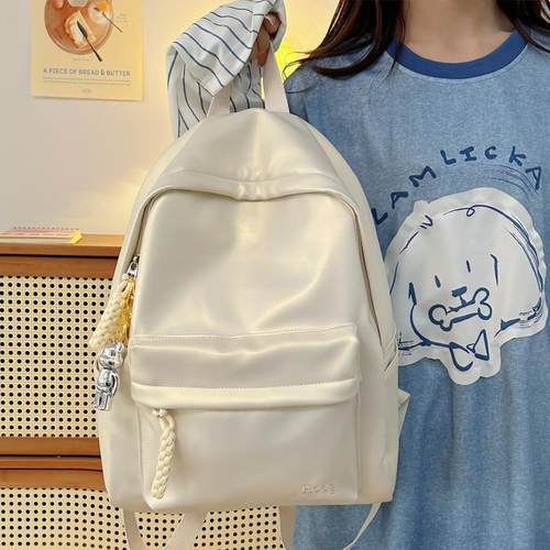 pu软皮书包炫彩珠光防水双肩背包