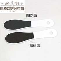 Remove calluses from hands, remove dead skin, exfoliate heel, grind foot stone, grind foot with dead skin, rub foot board