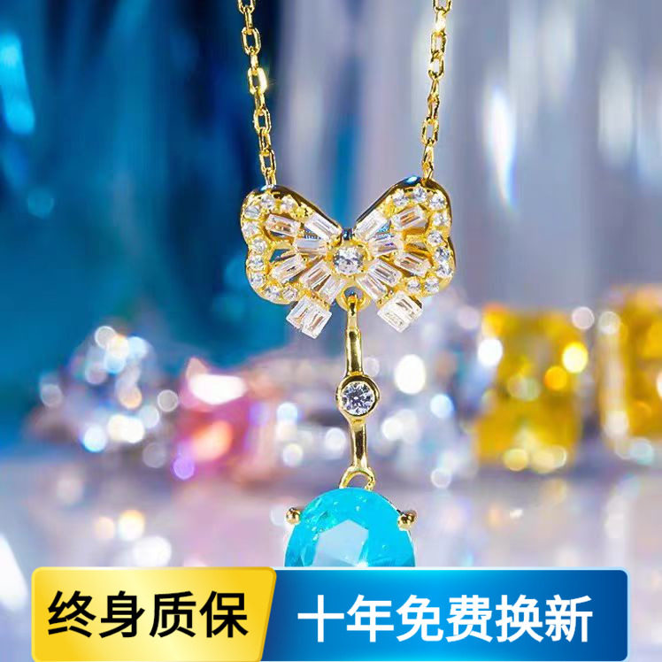 18K黄金镶嵌进口D色莫桑石蝴蝶结椭圆蓝钻吊坠项链轻奢精致设计感