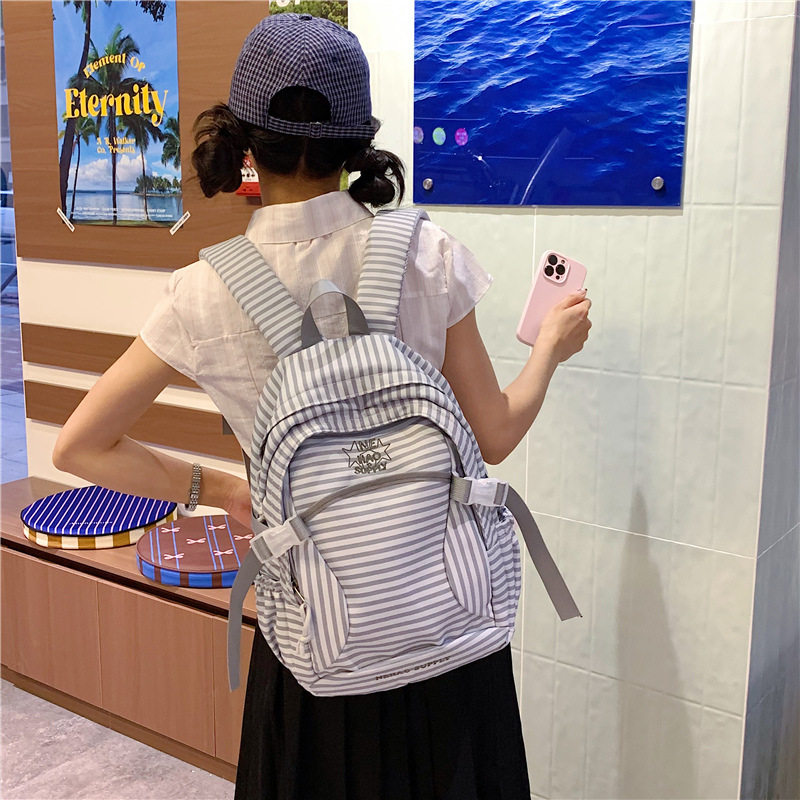 韩系小众学院风条纹书包女生双肩包初中生小清新高颜值轻便背包