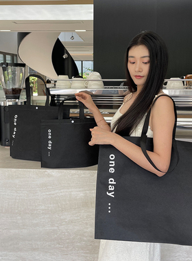 高级无纺布服装店手提袋子装衣服用黑色礼品购物大包装定制logo