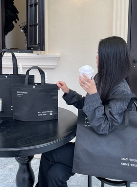 简约无纺布服装店手提袋子装衣服用黑色礼品购物大包装定制logo