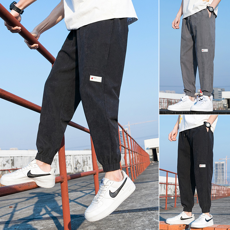 Spring new sportswear men's loose fitting pants with hems casual black pants trend