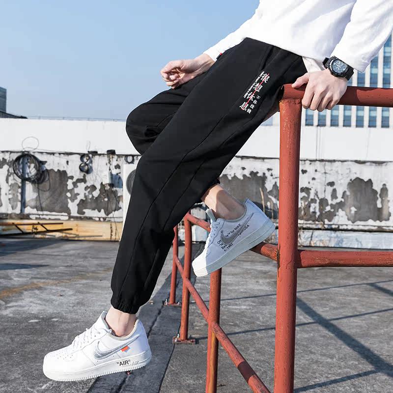 Spring new sportswear men's loose fitting pants with hems casual black pants trend