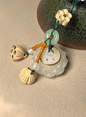 新中式古风香囊夜光石莲花吊坠随身佩戴香丸香薰檀木创意手机挂饰