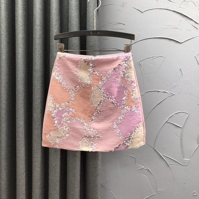 粉色减龄西装料拼接网纱高腰短裙