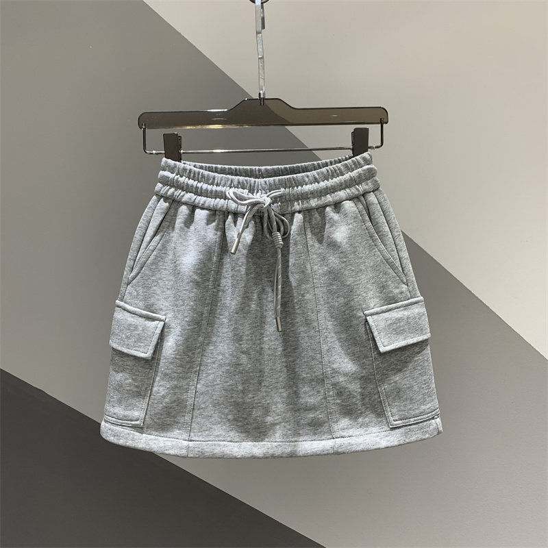 2026年夏季新款口袋设计工装休闲包臀短裙女百搭a字防走光半身裙