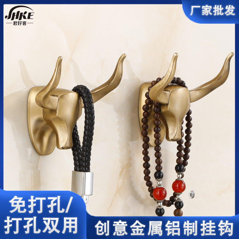 客厅浴室挂门后墙壁上牛头创意单勾玄关衣服帽柜免打孔金属铝