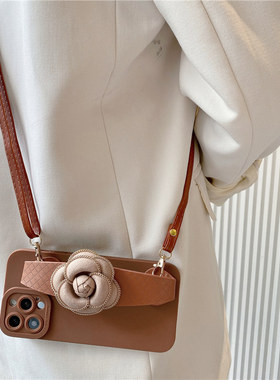 咖色金边山茶花腕带适用opporeno15手机壳reno14/13/12/11pro高档reno10皮质findx9/8S奢华A3女A5x软A6防摔套