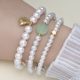 简约时尚 小众设计珍珠手链女ins风三件套叠戴领针手串饰品