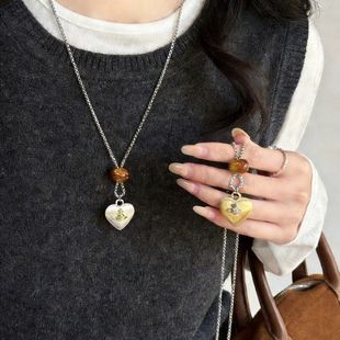 新款复古星球吊坠项链秋冬个性土星毛衣链小众高级感气质百搭配饰