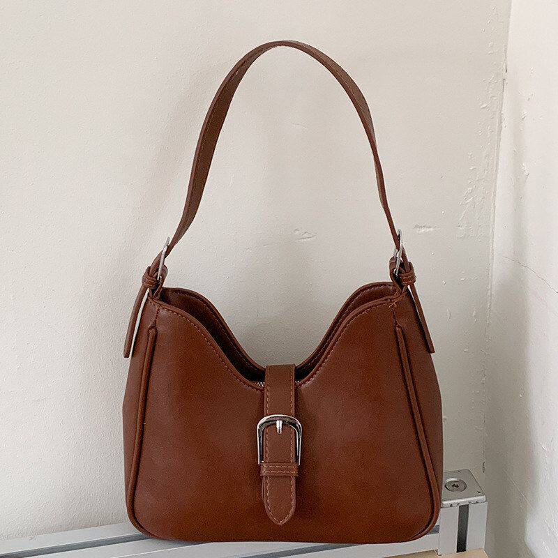 腋下包包大容量2026春季新款时髦复古单肩斜挎包皮带扣女士水桶包