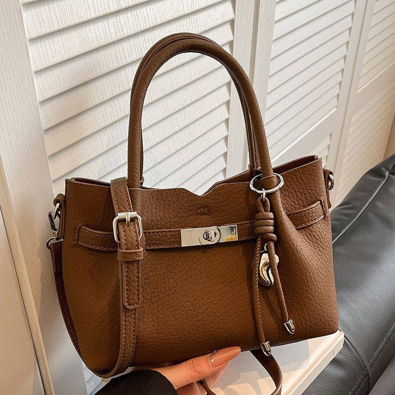 韩版时尚洋气手提包通勤简约单肩包2026春季新款个性休闲斜挎包包