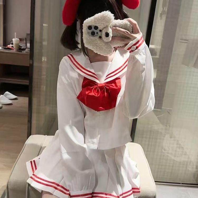 嫩粉色百褶裙套装长袖中间服正统