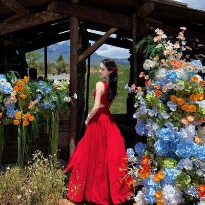 新疆草原旅行大西北沙漠拍照超仙度假长裙气质红色露腰斜肩连衣裙