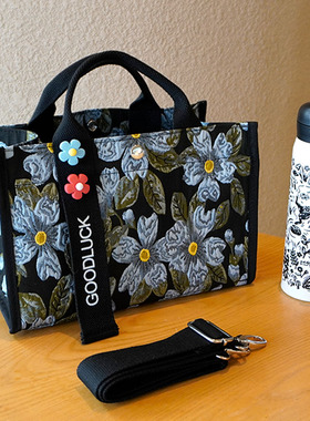 25年春法式绝美油画蓝色花朵手提包女士斜挎包上班高颜值饭盒袋