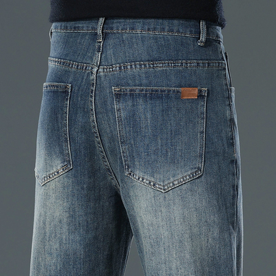 弹力牛仔裤男士宽松耐磨工作裤子