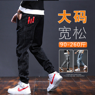 裤子男大码宽松弹力牛仔裤男士2026新款加肥加大冬季束脚工装长裤