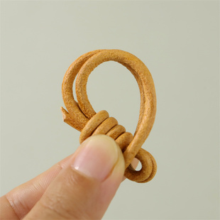 个性创意手工编织牛皮绳小挂件手把件挂绳编织球包包挂件挂绳防丢