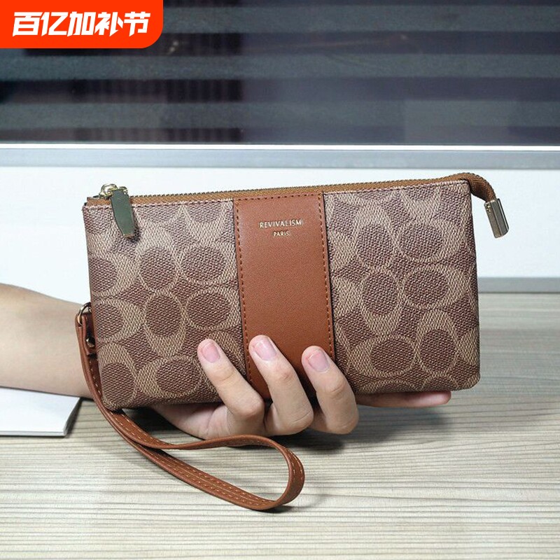 欧美时尚女士手拿包2026新款印花迷你手腕包装手机卡位手抓零钱包