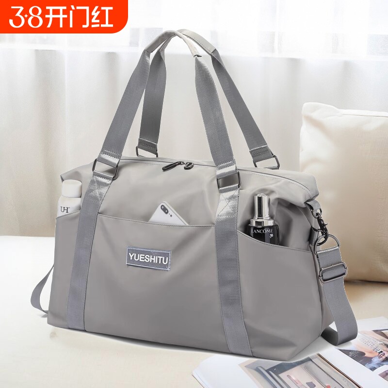 大容量手提短途旅行包女时尚轻便防水行李包男出差旅游收纳登机包